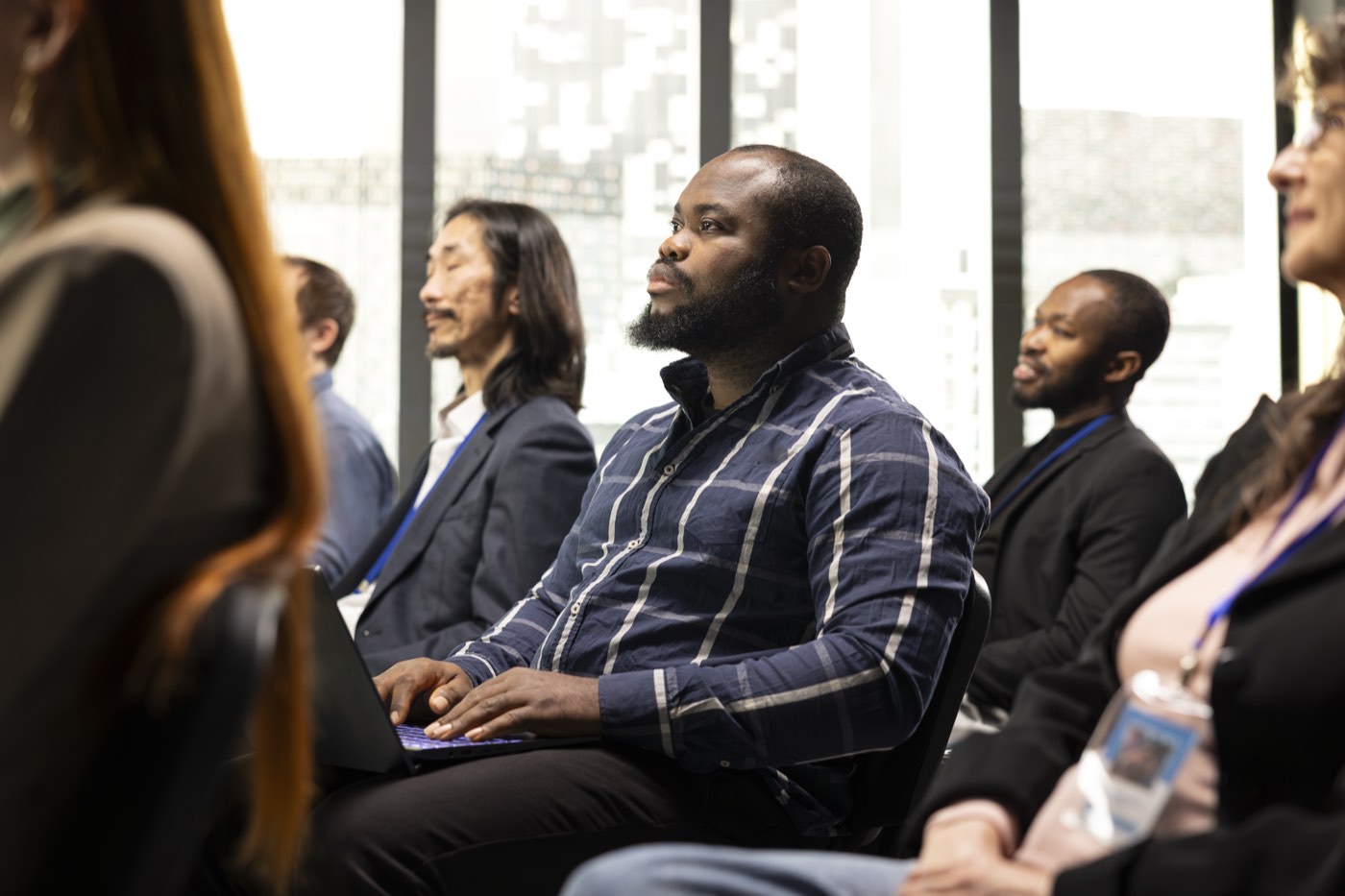 Staff seated together at a professional session