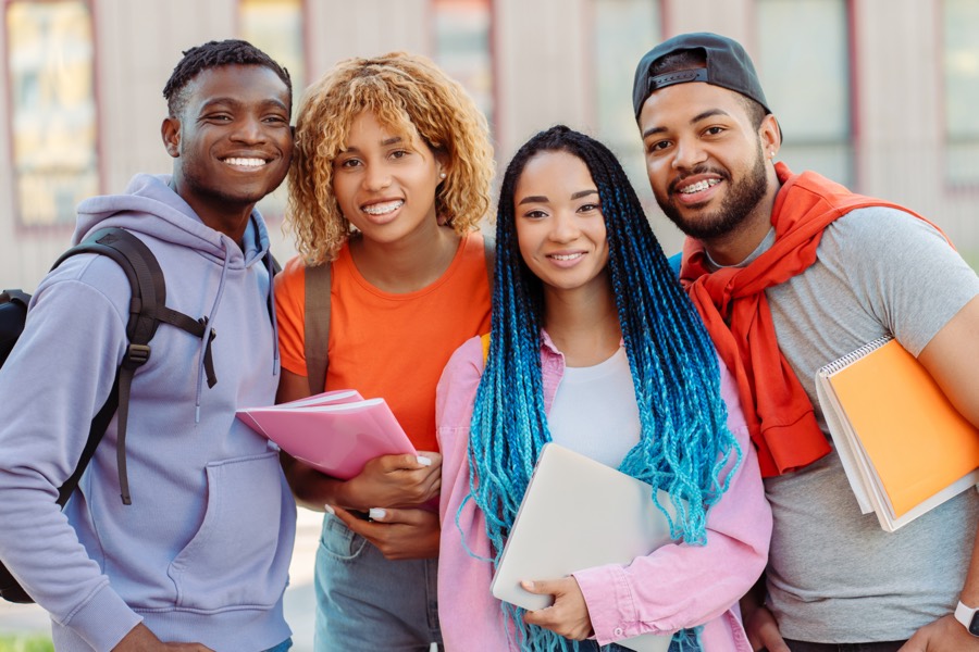 Students standing together on campus